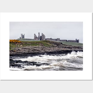 Rough waves battering the coast near Dustanburgh castle Northumberland, UK Posters and Art